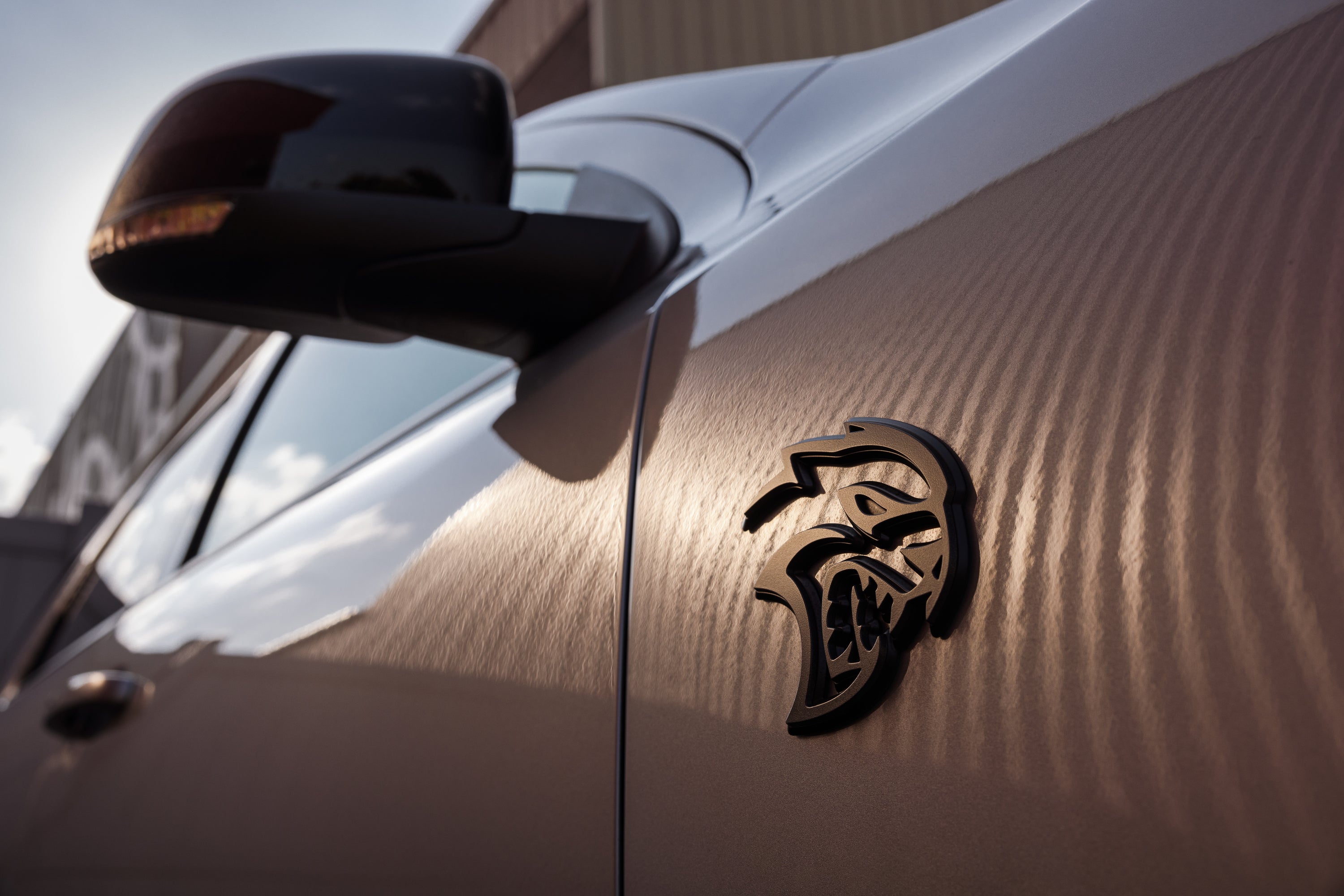 dodge durango with the hellcat emblem on the side