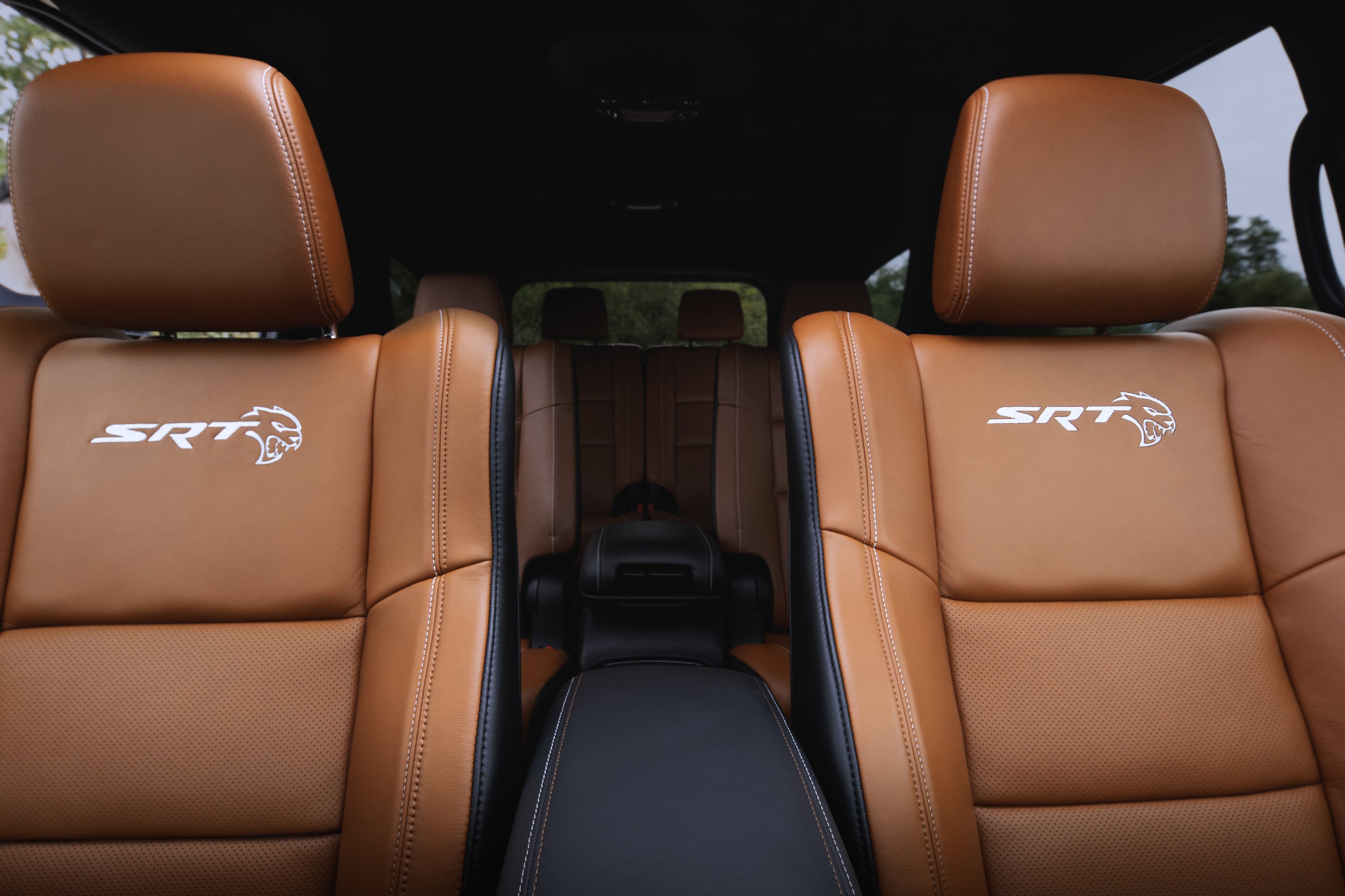 leather interior of a dodge durango with srt hellcat embossing