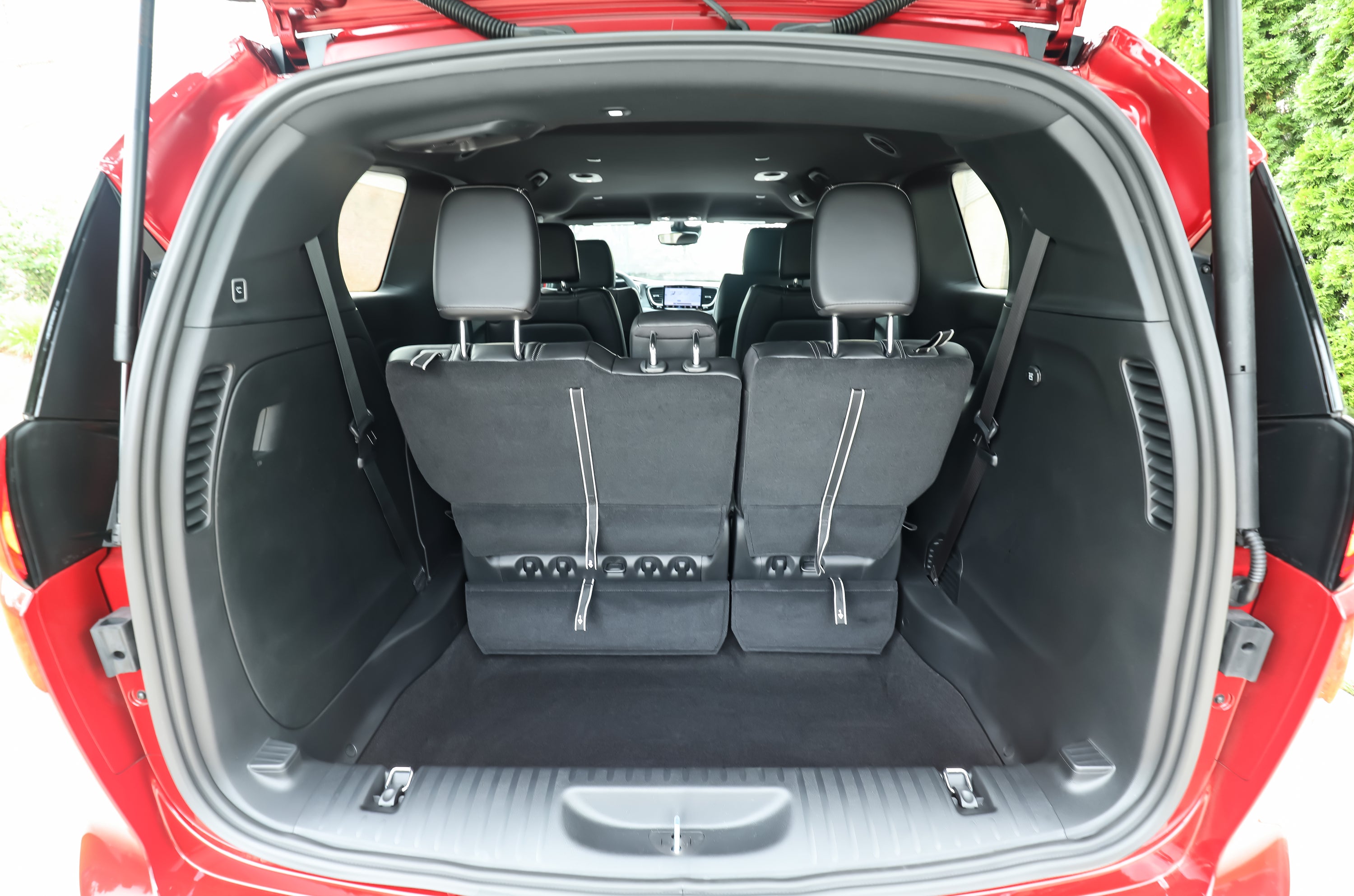 cargo space in a red chrysler voyager