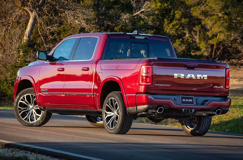 A red truck sitting parked.