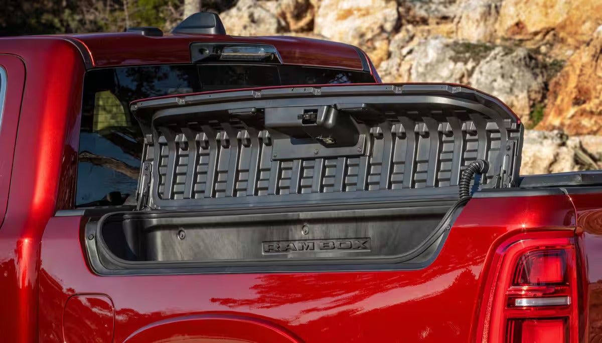 ram cargo management system on a red 2026 ram 1500