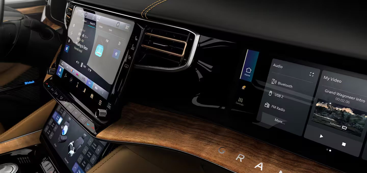 The front passenger dash and infotainment system of the 2025 Jeep Grand Wagoneer.
