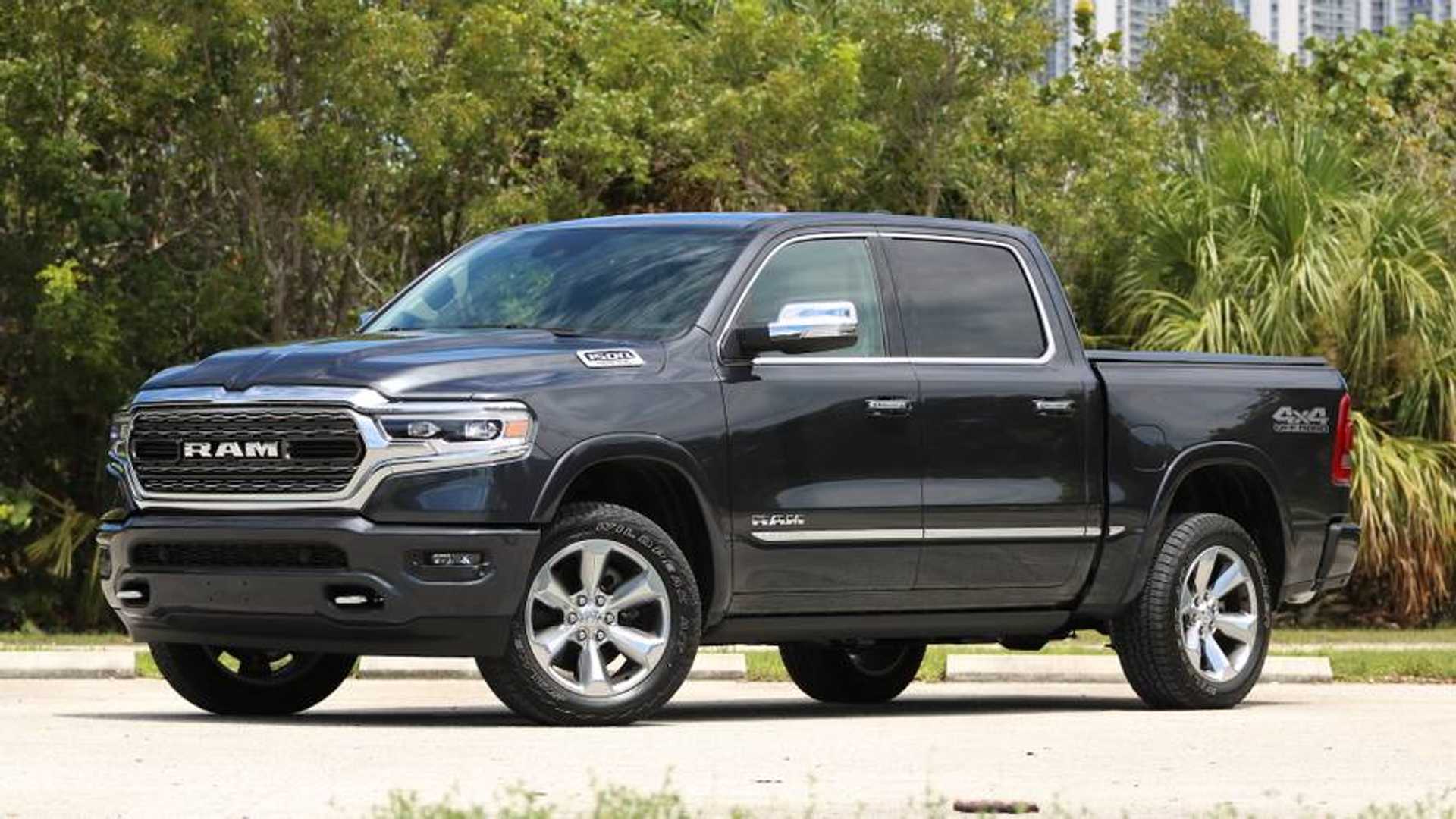 A 2019 Black RAM sitting on a roadway.